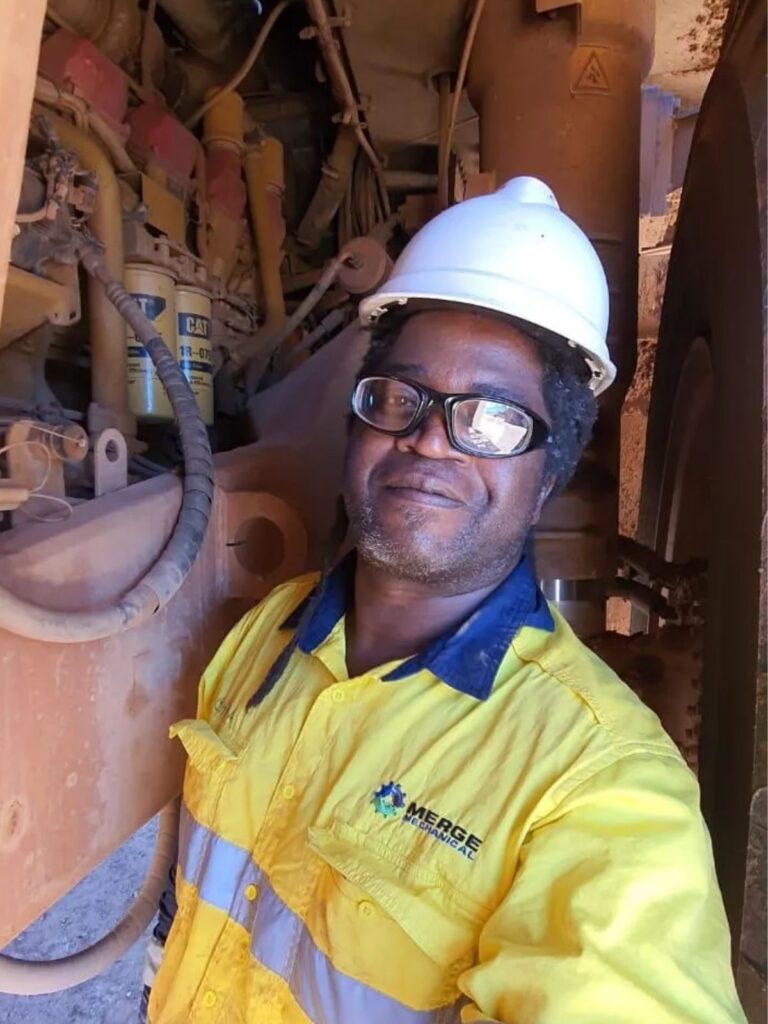 Heavy machinery undergoing field maintenance by Merge Mechanical technician